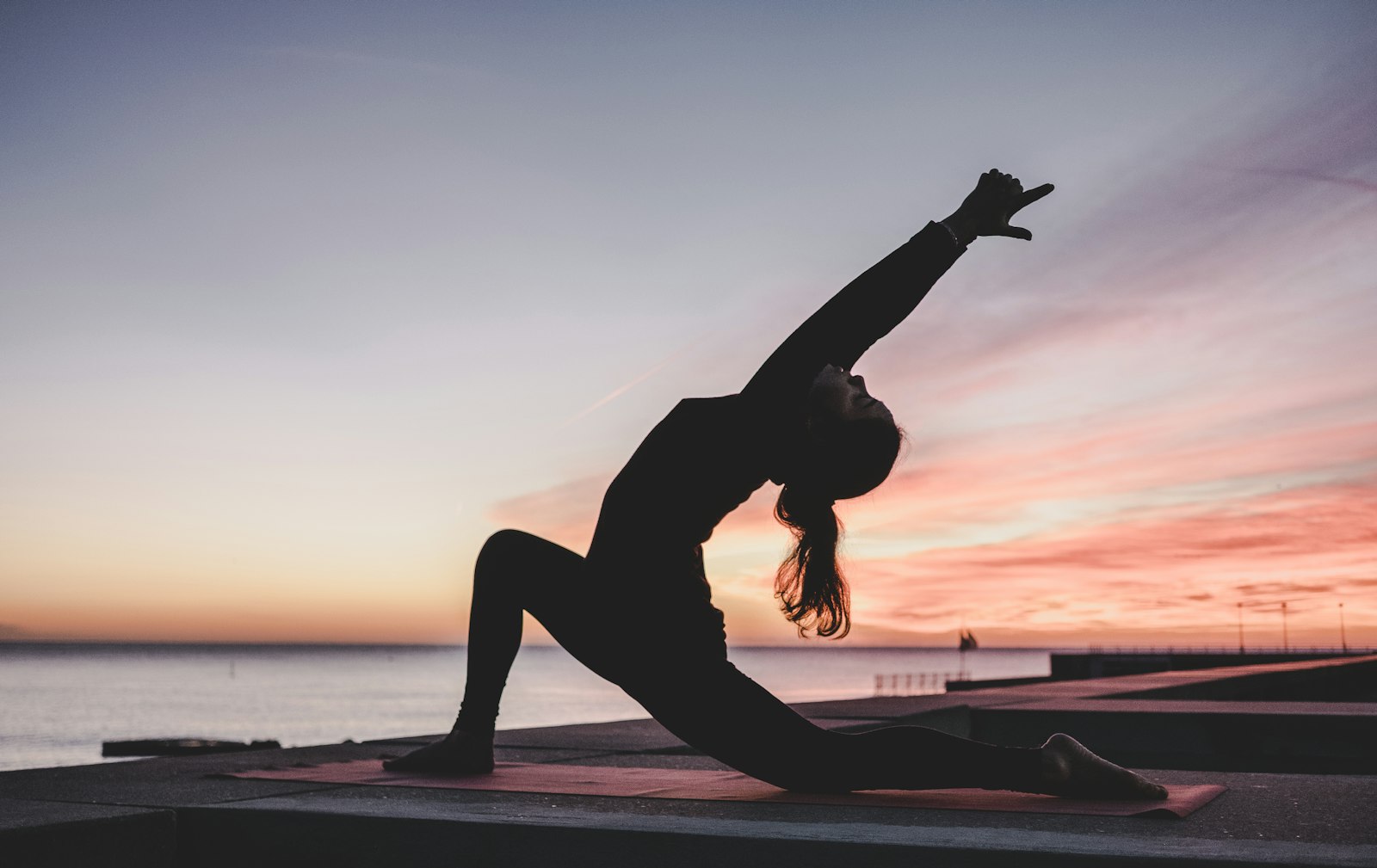 Athlete saluting the sunrise